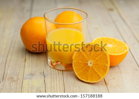 Composition of orange cut glass with juice Composition of orange cut glass with juice