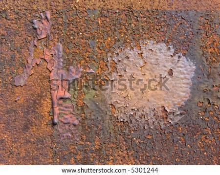 Beautiful eroded paint in vibrant colors on rusty steel, detail.  Found in the disused steel works \