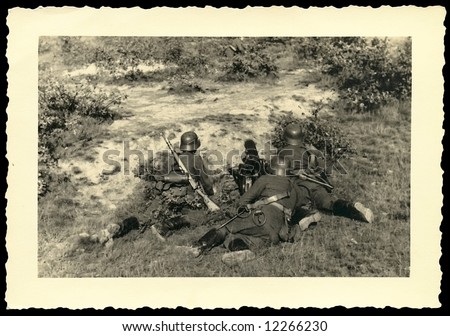 German soldiers with gun, World War II The photo was taken by my deceased grandfather. I am owner of all rights.