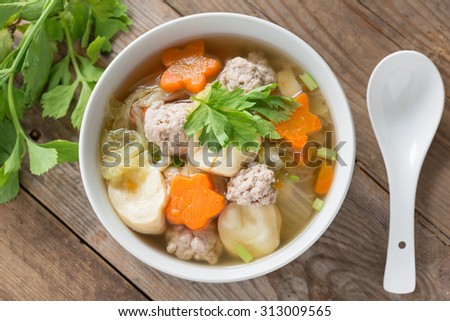 Clear Soup with Vegetables and Meatballs. Top view.