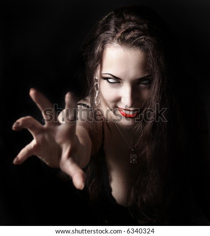 sexy vampire-girl on black background