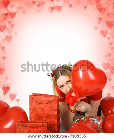beautiful blond girl with shining hearts and presents