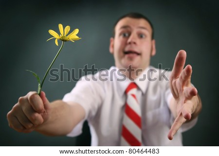 funny guy with yellow flower (focus on flower)