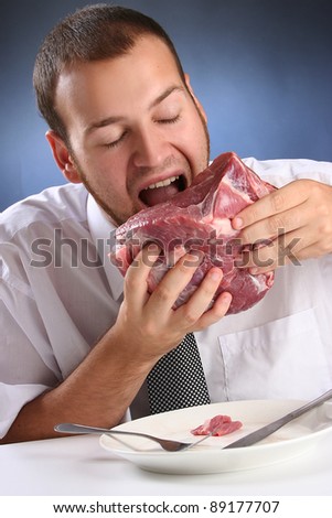 eccentric guy eating red meat