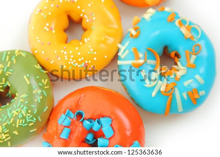 bright donuts on white background