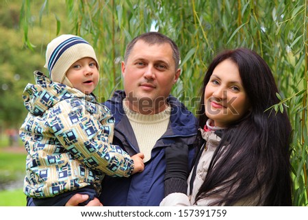 happy young family in park