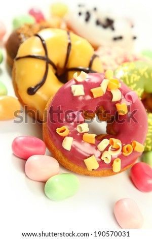 sweet bright donuts on white