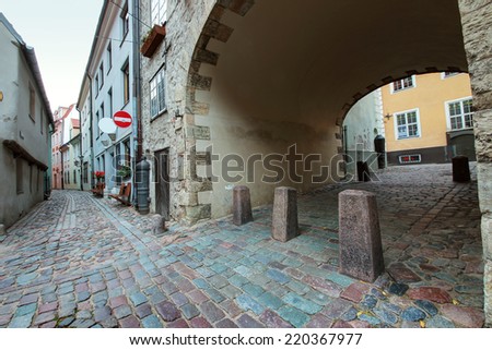 Narrow medieval street in old city of Riga, Latvia. In 2014, Riga is the European capital of culture