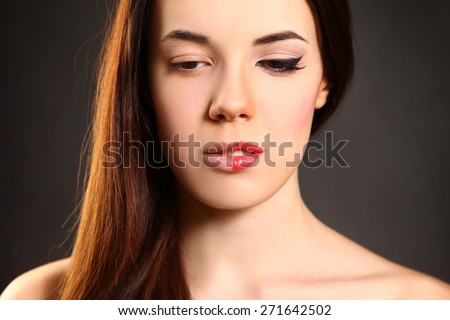woman\'s face before and after makeup
