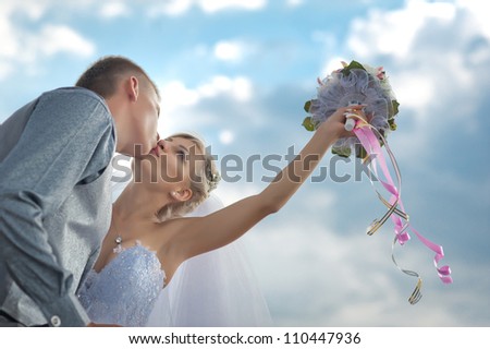 Groom and Bride. Wedding dress. Bridal wedding bouquet of flowers