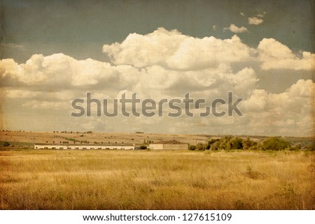 vintage image of a farm field. Texture of old paper