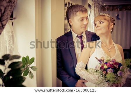 Groom and Bride. wedding dress. Bridal wedding bouquet of flowers