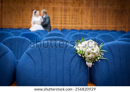 bride and groom in the concert hall