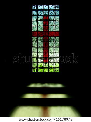 red cross represented at blue green window