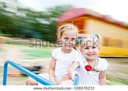 carousel rotates, the background is blurred motion