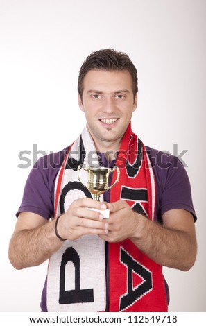 Portrait of a young attractive male poland fan.