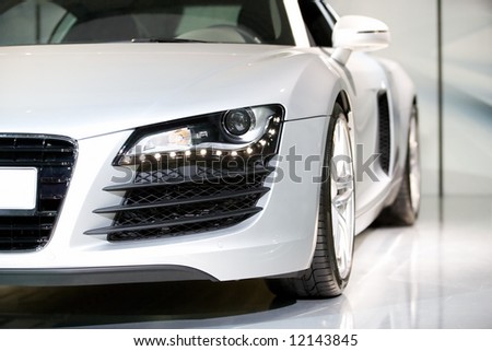 german luxury sport car close up shot