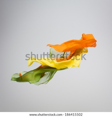 abstract pieces of fabric flying high-speed studio shot abstract pieces of fabric flying high-speed studio shot