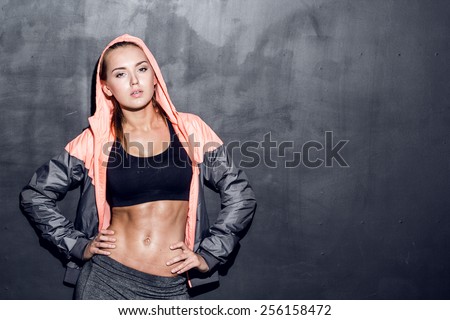 attractive fitness woman, trained female body, lifestyle portrait, caucasian model