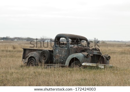 Antique Truck rusting on the prairie