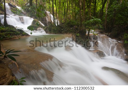 The beautiful Phasawan waterfall in rain season located in deep rain forest jungle at Kanchanaburi , Thailand