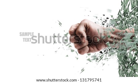 Concept. Power Fist Coming Out Of Cracked Glass Isolated On White Background