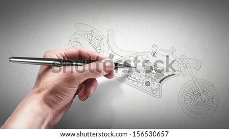 hand with the pencil drawing cad. engineer working on concept motorcycle (No trademark. it is design completely exclusive it is developed and made personally me)