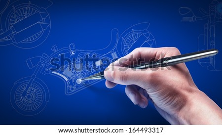Hand and blueprint . engineer working on blue print concept