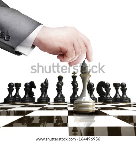 Strategy concept. hand holding white chess figure on chess board  isolated on white background High resolution