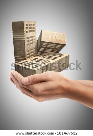 Man hand holding object ( group of red bricks )  High resolution