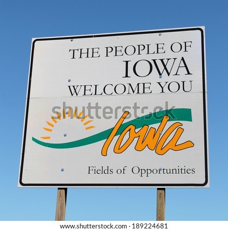Iowa welcome sign at the entrance to the state of Iowa.
