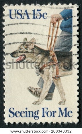 United States of America-Circa 1979: a stamp honoring the contributions of seeing eye dogs for the blind.