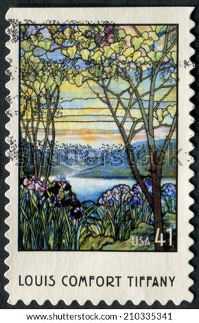 United States of America-Circa 2007: a stamp issued to honor Louis Comfort Tiffany who is well know for his stained glass window and lamps.