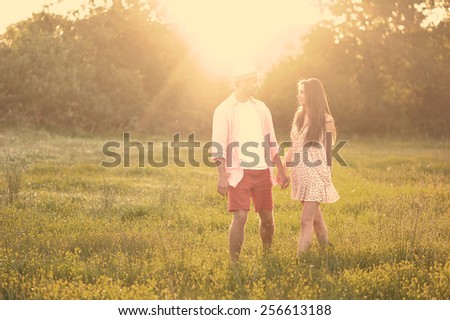 young young couple in love having fun and enjoying the beautiful nature
