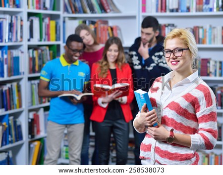 Group of students learning in the library and enjoy it