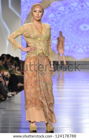 JAKARTA MAY 15 : model at fashion show by IPMI at Jakarta Fashion & Food Festival on May 15, 2012 Jakarta, Indonesia.