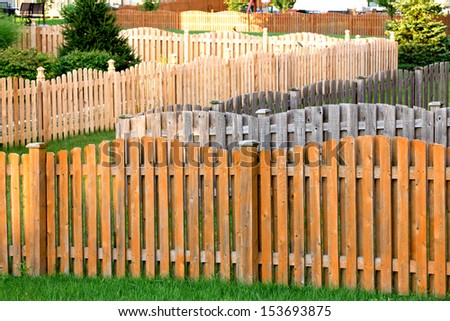 Staining wooden fence not easy job when you have lots of them, dream neighborhood for fence staining people