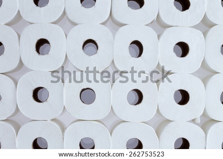 Full frame background pattern of white toilet paper rolls arranged in neat rows viewed from above - Toilet paper for everyone