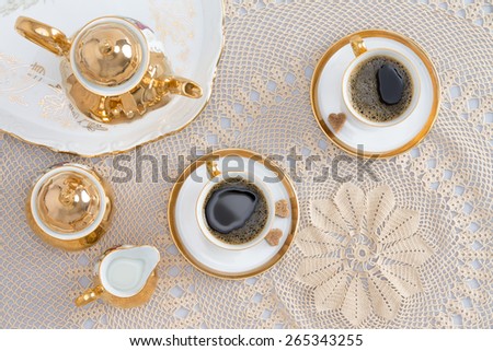Close up Cups of Turkish Coffee for Two, Good for Conversations, on Elegant White Table. Captured in High Angle View.