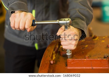 a man with a wrench