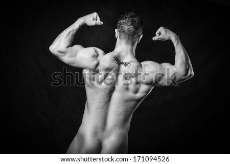 Muscled male model with strong arms
