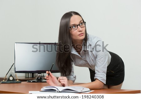 beautiful business woman holding a paper. office employee. smiling