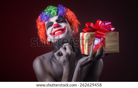scary clown makeup and with a terrible gift