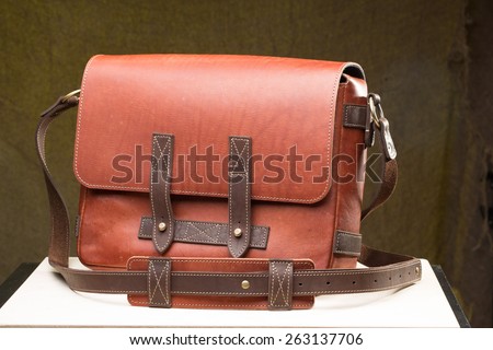 Old vintage leather bag with leather strap