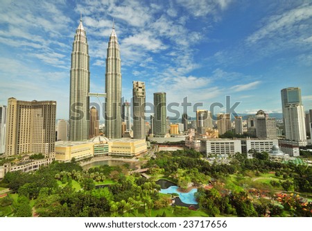 Petronas Twin Towers in Malaysia in Summer Sunny Day Beautiful Urban View Petronas Twin Towers in Malaysia in Summer Sunny Day Beautiful Urban View