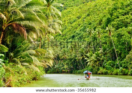 Cruising boat on Rainforest River