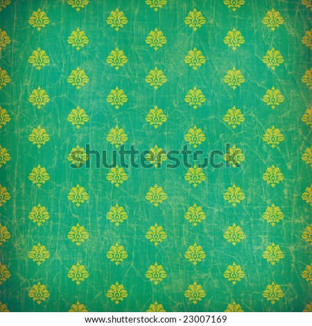 Weathered trendy green damask wallpaper with spots