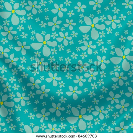 Elegantly flowing satin fabric with little flowers in blue, green, yellow