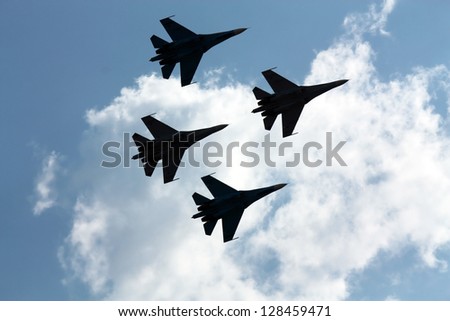 Perform aerobatics by the russian aircraft at the airshow