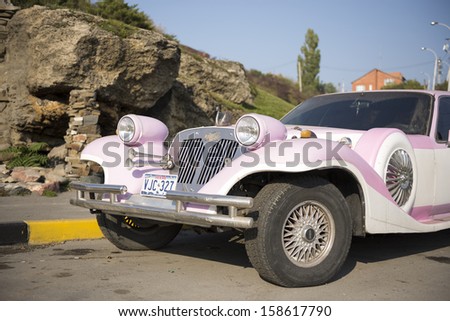 ROSTOV-ON-DON, RUSSIA-OCTOBER 13 - Executive Limousine pink in Rostov-on-Don in October 13, 2013 in Rostov-on-Don